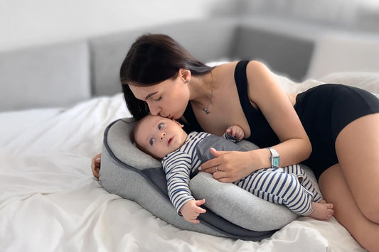 Is It Safe for a Baby to Sleep in an Incline Bed With a Swaddle or Sleep Sack?